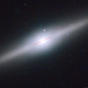 Illustration for article titled Unique mid-sized black hole is the lonely survivor of a shredded galaxy